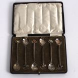 A set of six Art Nouveau style teaspoons, apparently unmarked,