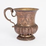 An Irish silver mug, John Neville, Dublin 1833, of bell shape with ribbed and lobed lower half,