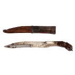 A Ceylonese dagger (piha kaetta), 18th Century, with carved horn grip, white metal mounts,