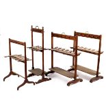 A pair of mahogany boot racks, with brass handles and end standard supports (distressed), 76.