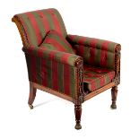 A Regency rosewood armchair, in the manner of Morel & Seddon, with deep upholstered back and seat,