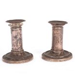 A small pair of Victorian silver candlesticks, Sheffield 1890,