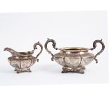 A Victorian silver milk jug and sugar basin, Bateman & Ball, London 1840, of fluted melon shape,