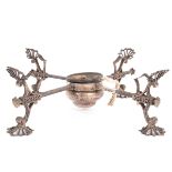 An early George III silver dish cross, London 1760, with typical sliding feet and central lamp,