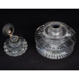 A large glass inkwell with lemon squeezer base,