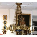 An early 20th Century gilt-metal six-branch chandelier,