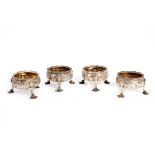 Two matching pairs of George III silver salt cellars, one pair D Hennell, London 1762,