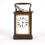 A French carriage clock with enamelled dial and repeat,