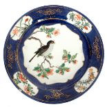 A Chinese powder blue ground famille verte plate, Kangxi,