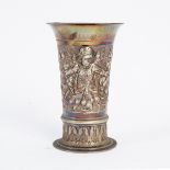 A German beaker, circa 1890, embossed with a winged cherub wearing a breastplate,