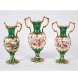 A garniture of three English porcelain green ground two-handled vases, circa 1830, Minton,