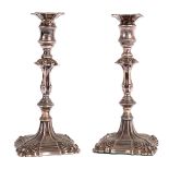 A pair of mid 18th Century style silver candlesticks, S. Waterhouse & Co.