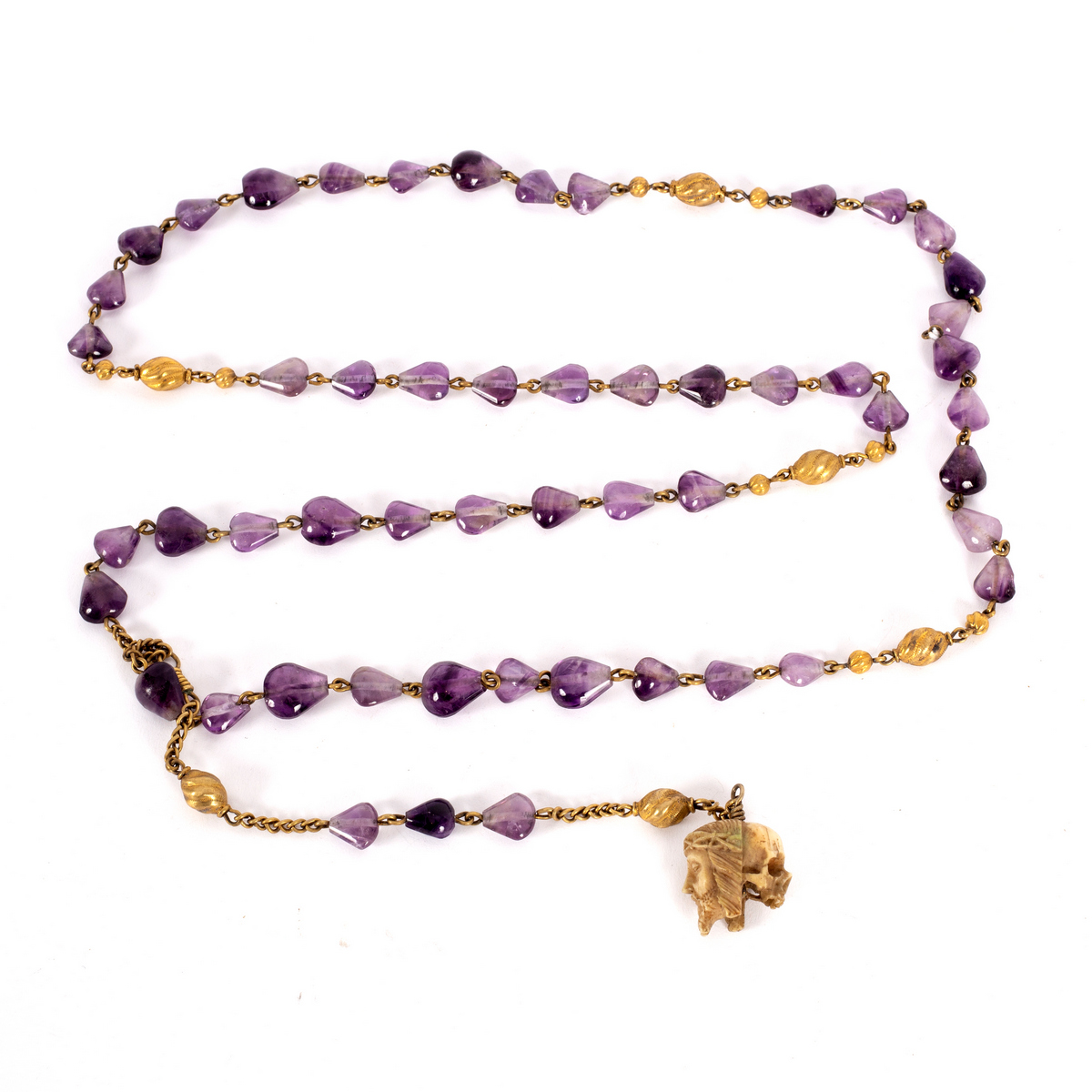 An amethyst quartz and silver-gilt bead rosary, possibly 16th Century,