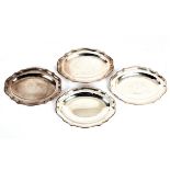 A set of four George III silver meat dishes, Parker & Wakelin, London 1766, shaped oval,