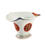 A Chinese porcelain libation cup, Qianlong, with bat to lip,
