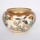 A Japanese satsuma bowl, circa 1910, decorated with finches and flowering bushes,