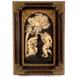 An Italian ivory relief, 19th Century, after Algardi, with ebonised frame mounted in gilt-metal,