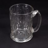 A Bohemian flat-cut glass mug, circa 1760, cut with oval windows and chevrons,