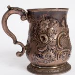 A George II silver mug, Richard Zouch, London 1736, later embossed and monogrammed HCMK,