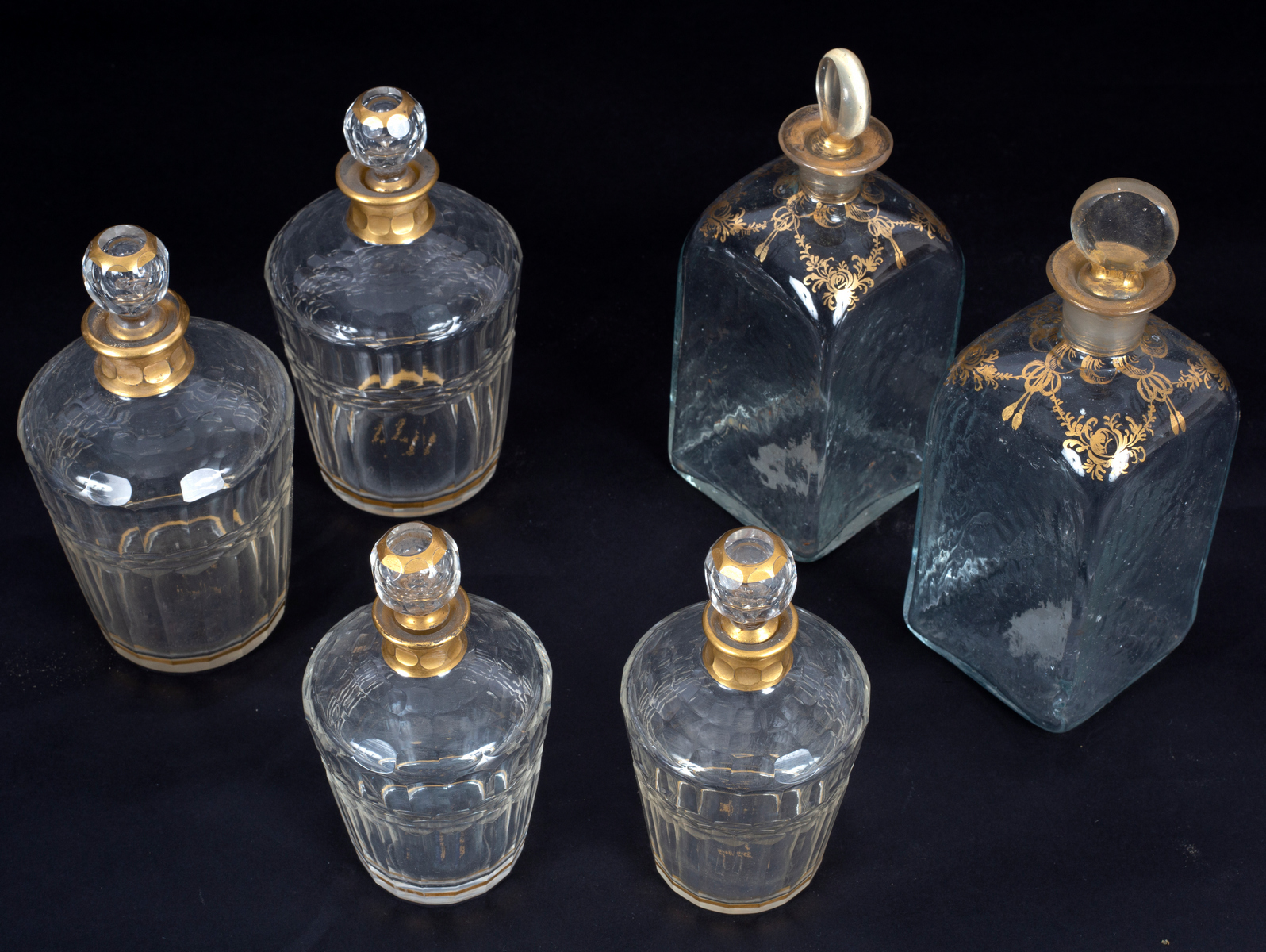 A set of four decanters and stoppers with gilt collars, marked Daum Nancy, in two sizes, - Image 3 of 5