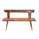 A mid 19th Century alpine walnut settle,