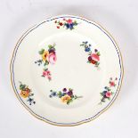 A Nantgarw dinner plate, circa 1820, painted in Sèvres style,