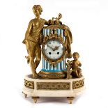 A French gilt metal mounted mantel clock, the white enamel dial signed Merra à Paris,