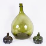 A large green glass flagon,