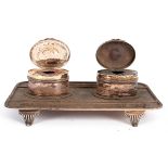 A Victorian silver partners' inkstand, London 1890, with reeded rim, 23cm wide,
