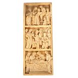 An ivory relief in Gothic style, in three registers, showing the Descent from the Cross,