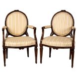 A pair of carved framed fauteuils,