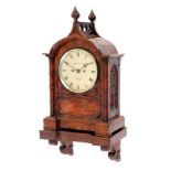 A Victorian walnut cased bracket clock the circular dial signed Wymark & Son, London,