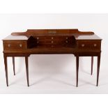 A mahogany converted square piano, fitted drawers on square taper legs,
