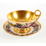 A French porcelain oversize teacup and saucer, circa 1820,