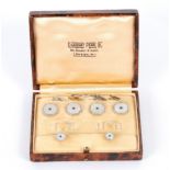 A gentleman's part dress set in sapphire, mother-of-pearl and 9ct white gold,