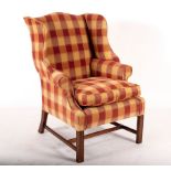 A George III style wingback armchair,