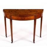 An 18th Century satinwood card table of Adam design,