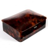 A tortoiseshell box with silver hinges,