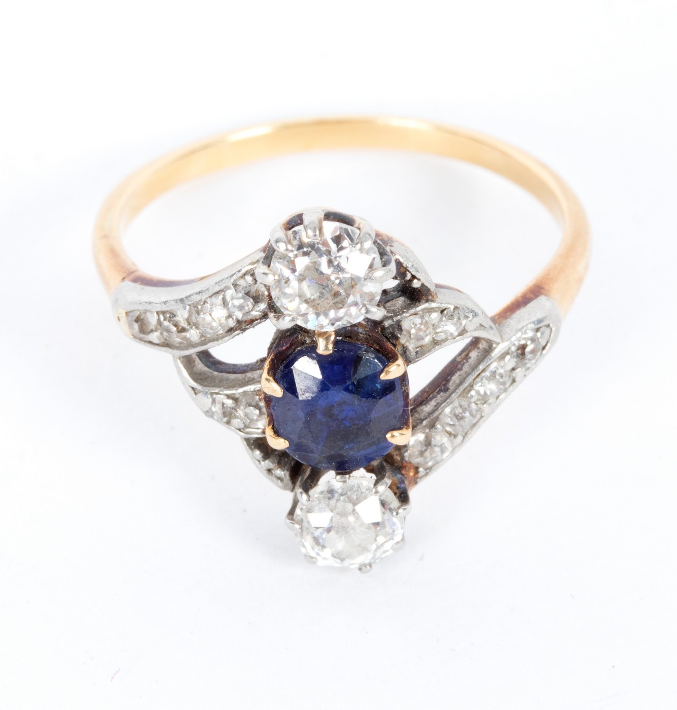 A sapphire and diamond dress ring with split shoulders,
