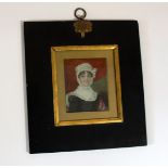 Portrait Miniature of a Lady/wearing a black dress and white bonnet/watercolour on ivory,