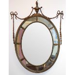 A late 18th Century gilt gesso oval wall mirror,