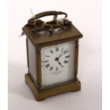 A gilt brass cased carriage clock, the dial signed Mappin & Webb Ltd.