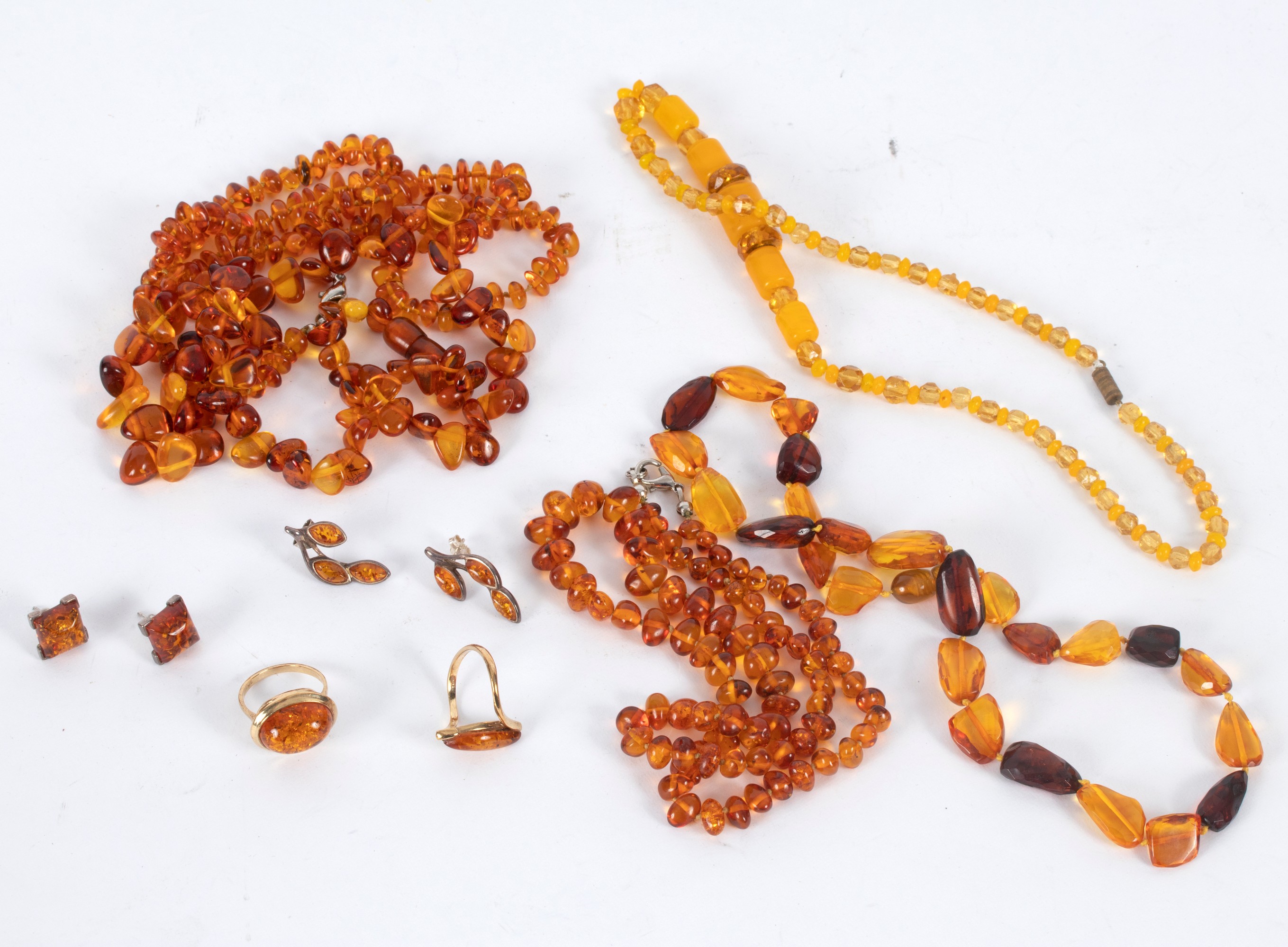 A quantity of amber bead necklaces,