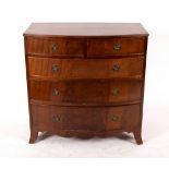 A mahogany bowfronted chest of two short over three long drawers, on splay feet, 91.