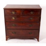 A George III mahogany chest of two short over three long graduated drawers on bracket feet,