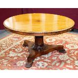 A Regency rosewood circular dining table,