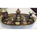 A Coalport blue ground oval two-handled inkstand, decorated with pattern no.