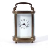 A miniature eight-day carriage clock, 10cm high,