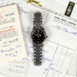 A gentleman's Rolex Oyster Explorer wristwatch, with black gloss dial, on an associated bracelet,