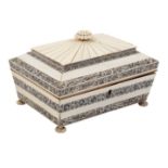 An early 19th Century Anglo Indian ivory work box with reeded finial and cover,